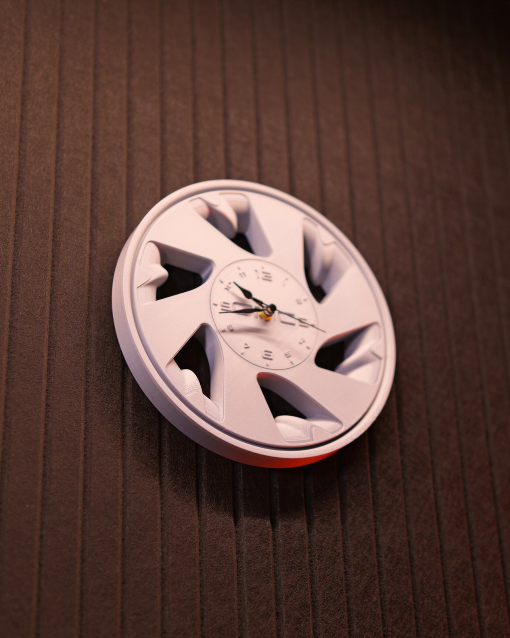 Syclone wheel wall clock 240mm automotive garage decor in matte finish mounted on wall