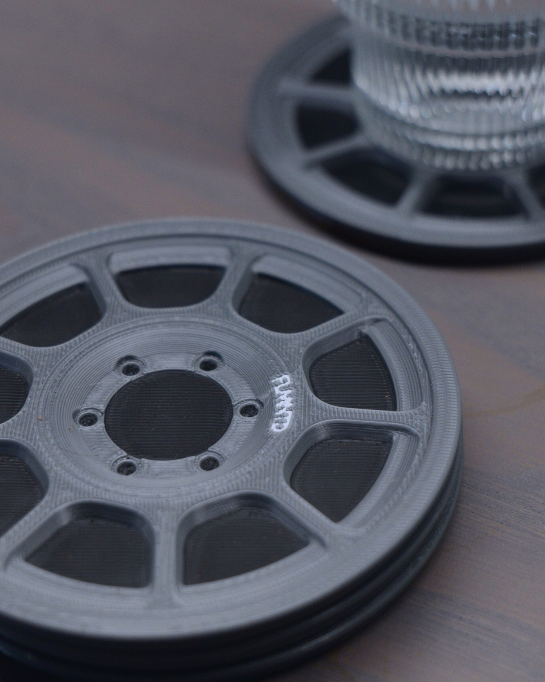 car themed coasters stored in miniature tire holder